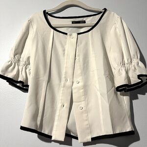 White blouse with puffed sleeves